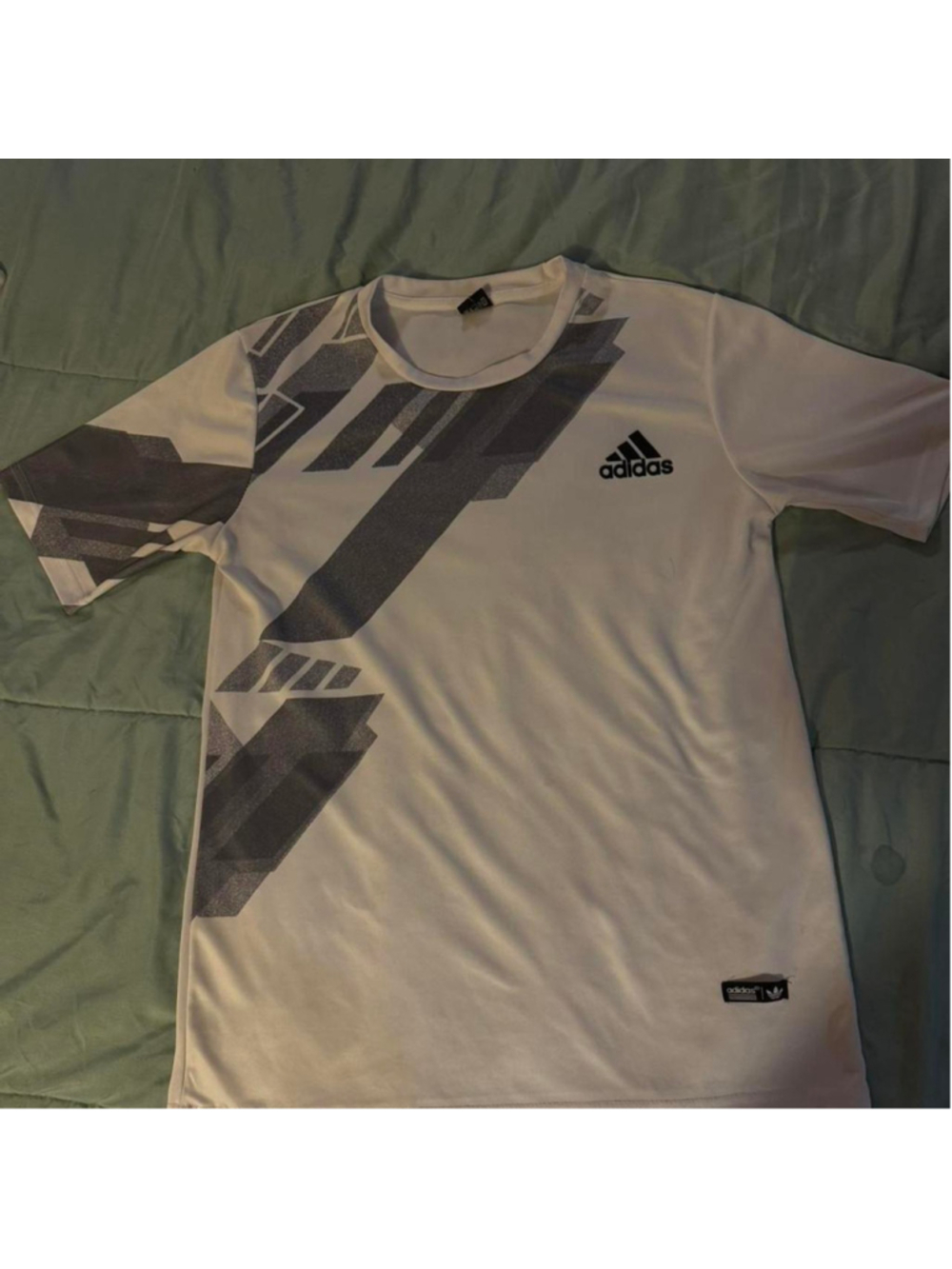 adidas Men's Freelift Printed Tennis T-Shirt (specifically the premium HEAT